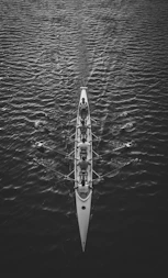 people riding boat on body of water