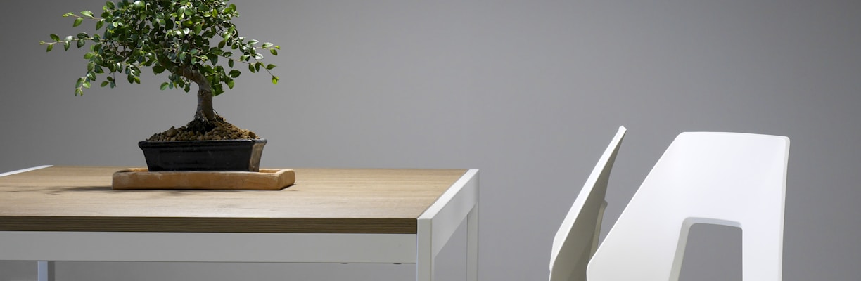 white and brown wooden table and chair set