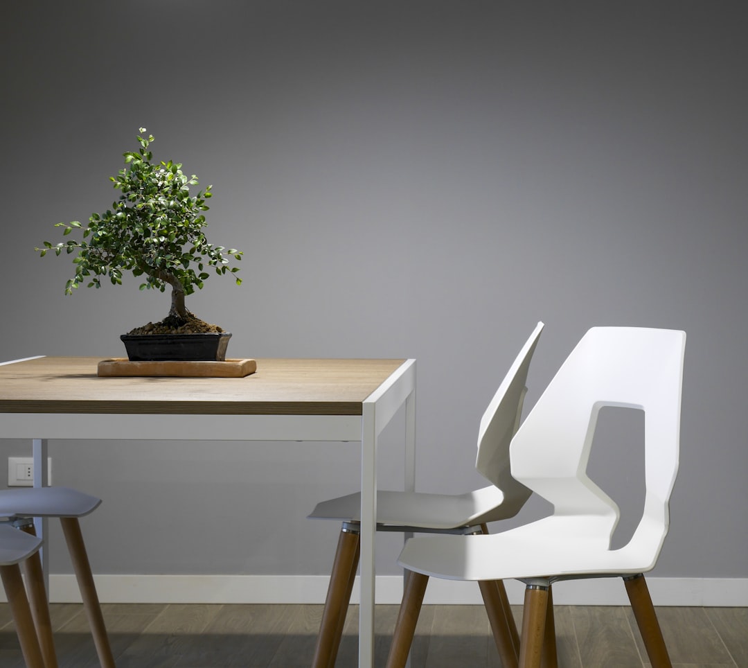 white and brown wooden table and chair set,