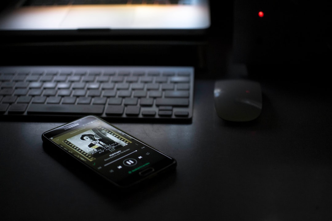 smartphone beside keyboard