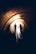 silhouette of man and woman inside tunnel