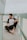 man smiling while sitting on floor during daytime