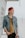 man leaning on wall