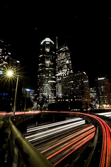 Graph showing steady website traffic growth against the backdrop of a city skyline.