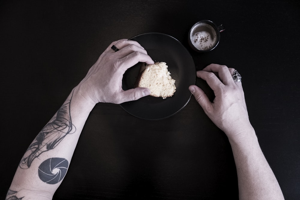 person holding bread