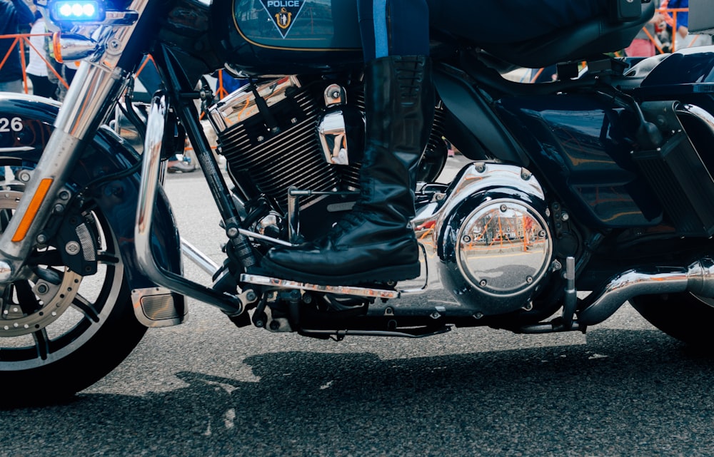 man riding green cruiser motorcycle