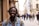 selective focus of man smiling near building