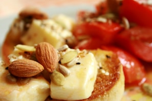 Close-up of a plate with authentic Catalan cuisine, featuring pa amb tomàquet.