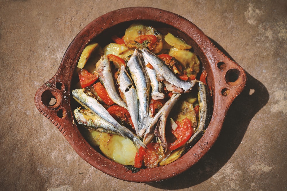 fish on brown round plate