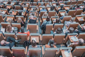 High-angle view of an audience seated at an event