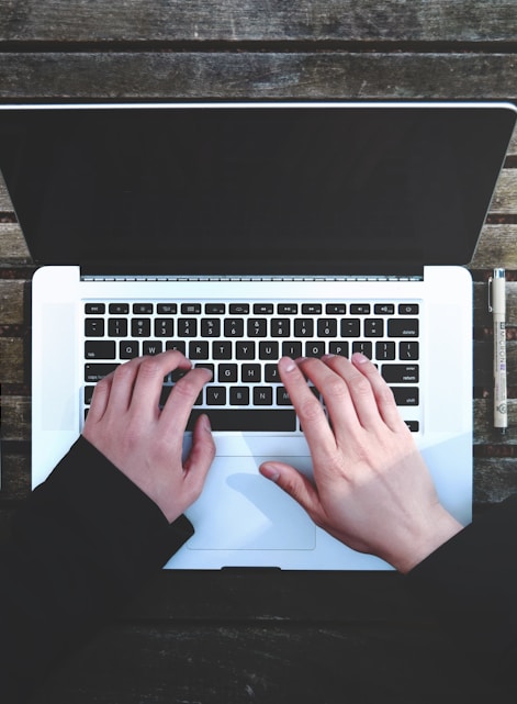 flat-lay photography of person about to use laptop computer