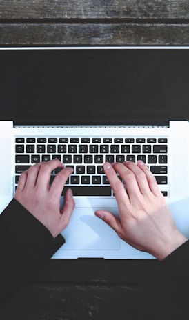 flat-lay photography of person about to use laptop computer