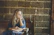 A thoughtful student reflecting on lessons in a cozy study space.