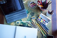 A cozy workspace with crayons, pencils, and printed activity sheets ready for creative fun.