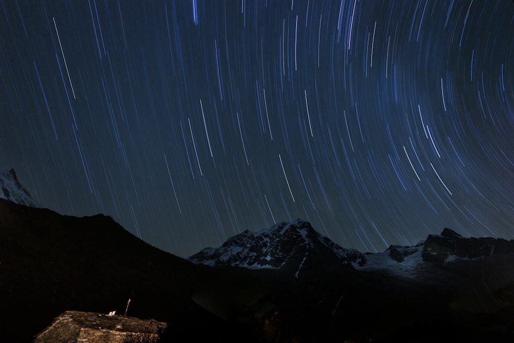 mountains under starry night