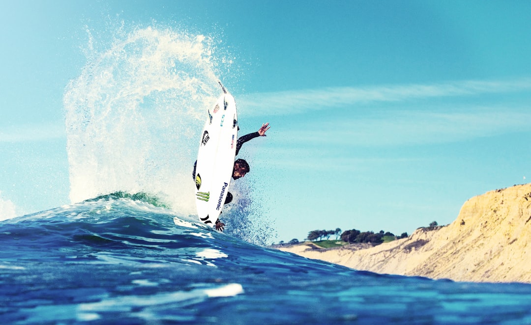 man surfing near land