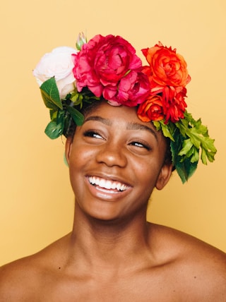 woman smiling wearing flower crown