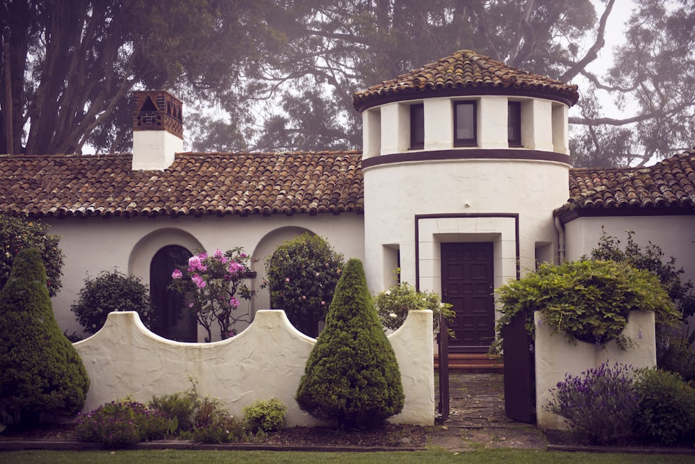 white and brown concrete house at daytime