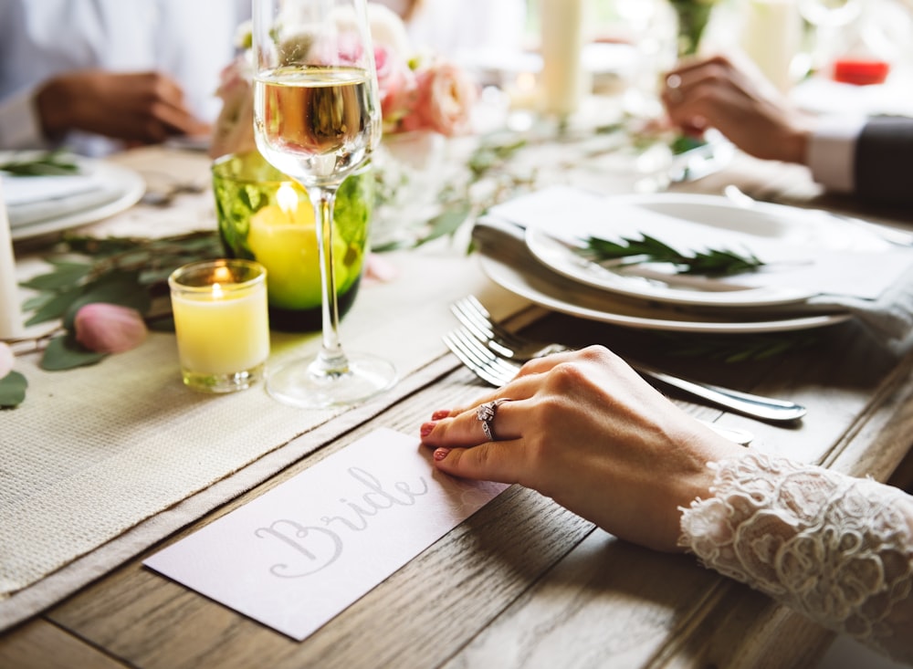 bride hand on wooden table