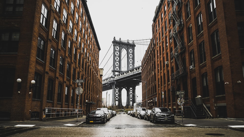 cars parked near brown building