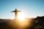 person standing on hill