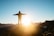 person standing on hill