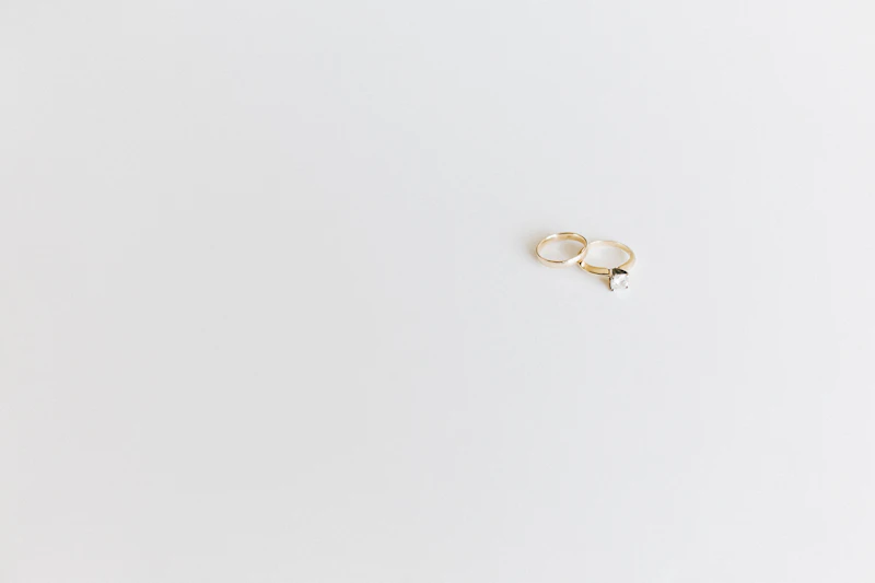 Gold rings on a plain surface