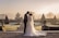 A couple stands in an elegant garden setting, sharing a kiss. The bride wears a flowing white gown with intricate lace details, and the groom is dressed in a dark suit. The garden features manicured hedges and ornamental urns, with a soft, golden sunrise casting a warm glow over the scene and creating a serene atmosphere.