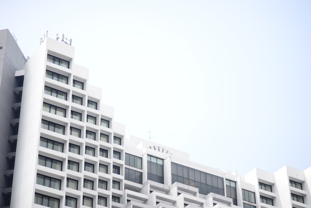 low angle photography of white concrete building