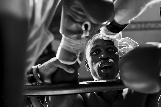 Close-up of intense focus on a competitor’s face before a tournament match.