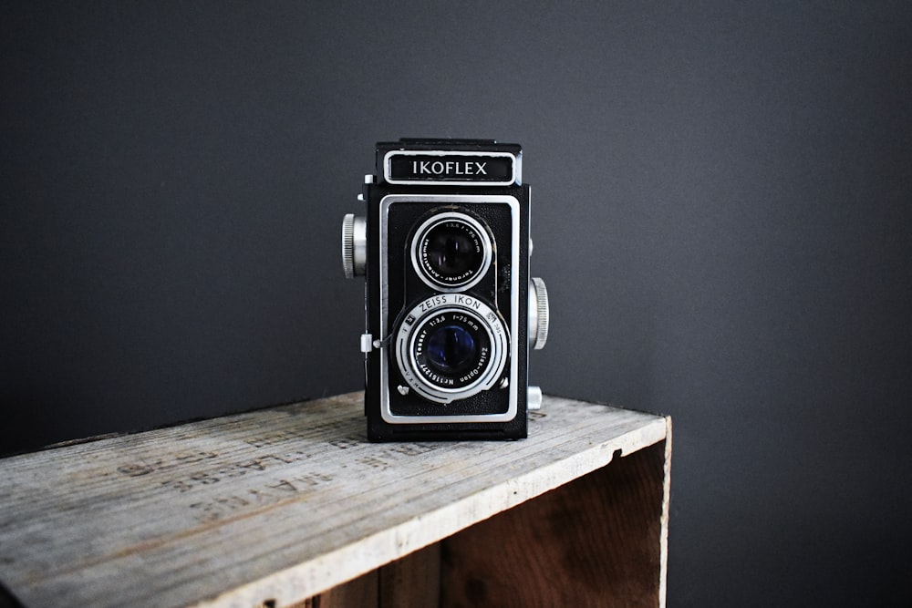 black camera on side table