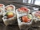 Close-up of a colorful plate of assorted makis with fresh ingredients.