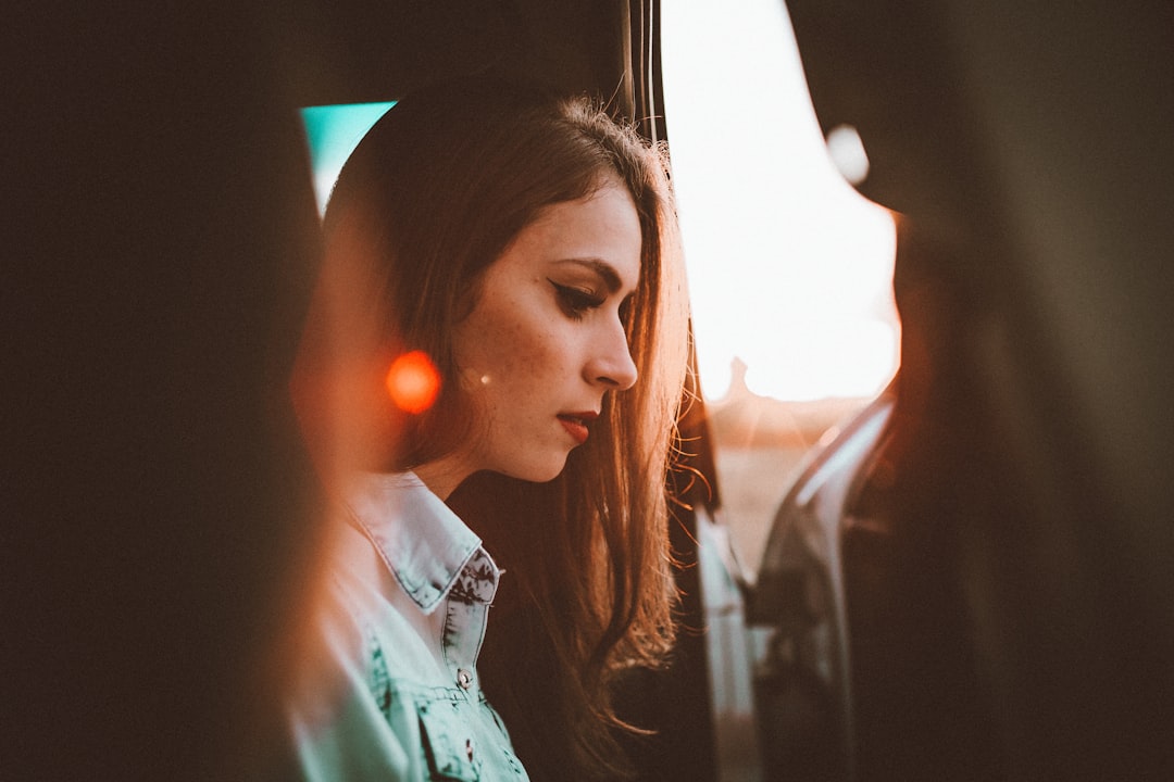 woman in white collared shirt