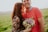 smiling woman hugging smiling man during daytime