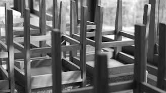 Stack of restored wooden furniture pieces waiting to be delivered to happy customers.