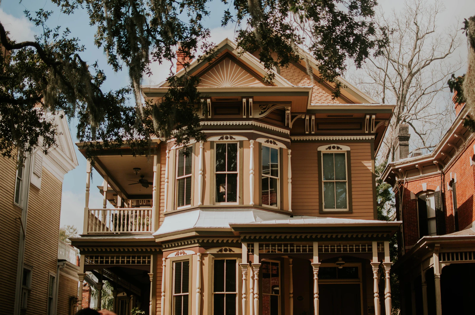 Two-story colonial home with front lawn