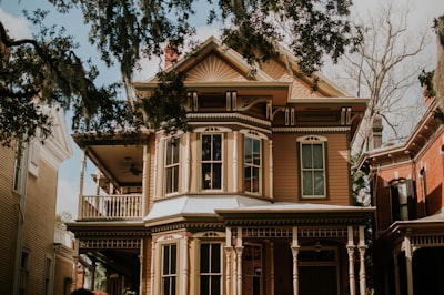 beige 2-story house victorian zoom background