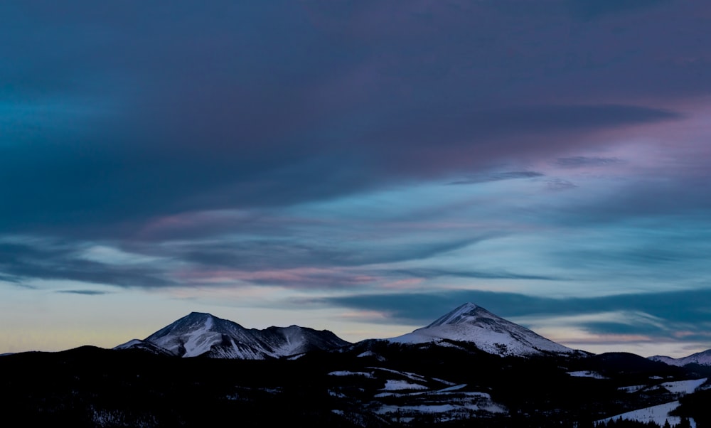 landscape photography of mountain alps during cloudy skies