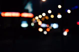 Abstract urban nightscape with blurred lights mimicking a slow shutter effect.