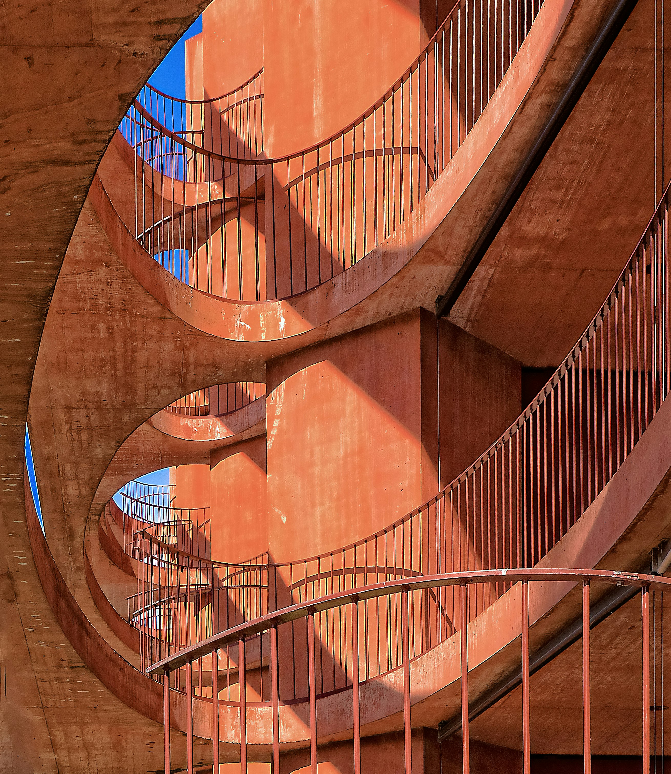 low angle photography of orange concrete building