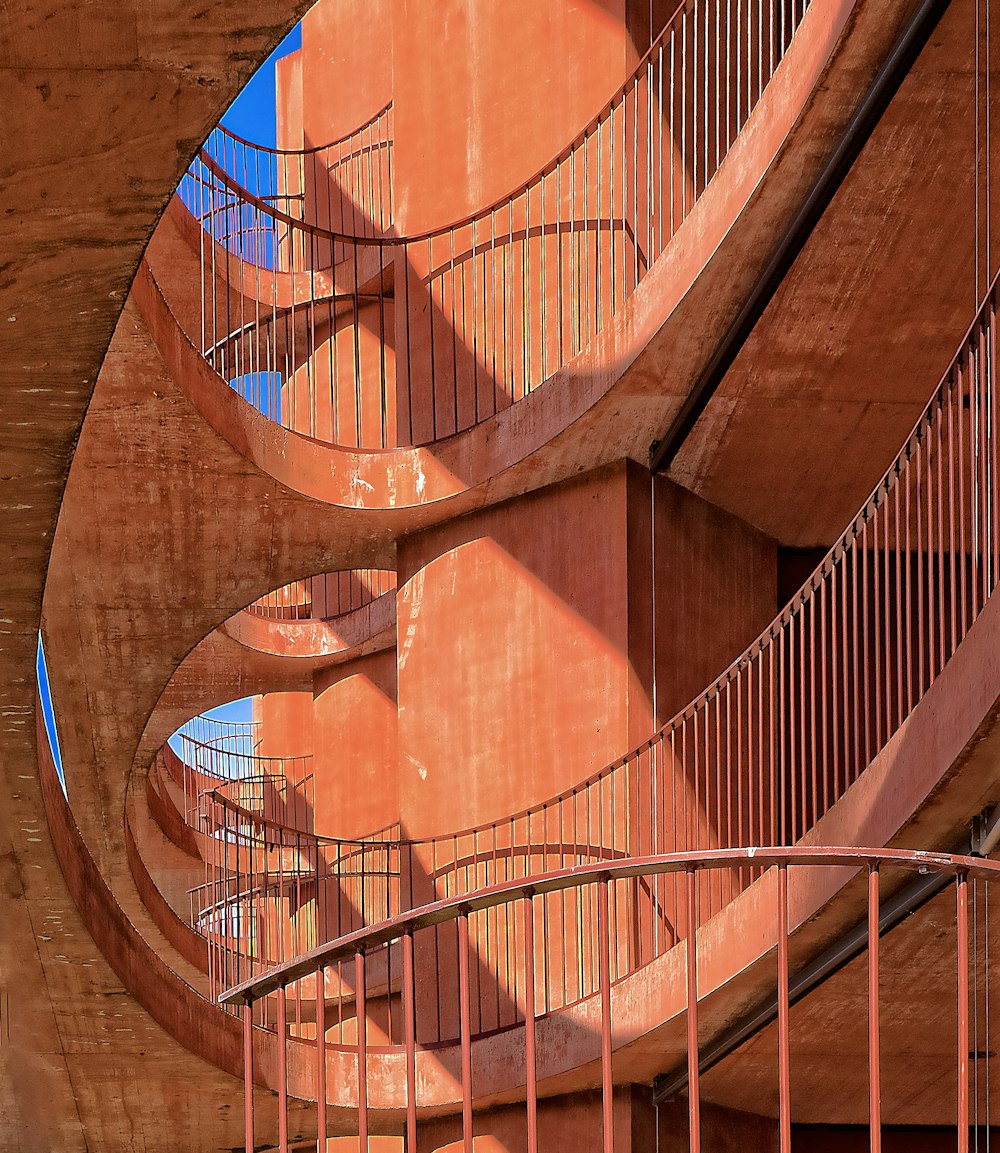 low angle photography of orange concrete building