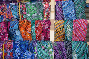 Array of printed fabric samples showcasing crisp details and bright colors.