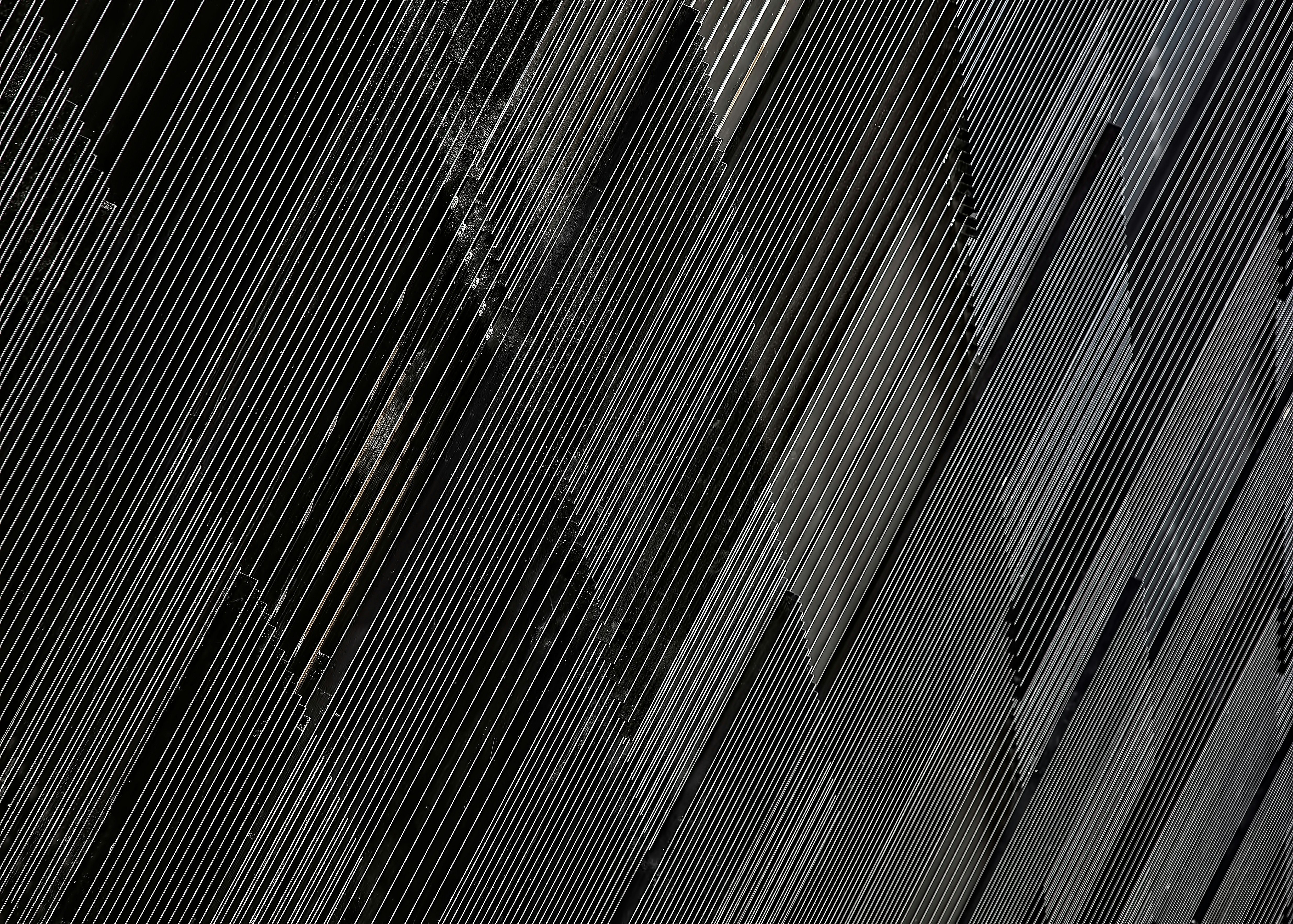 close-up photograph of black concrete wall