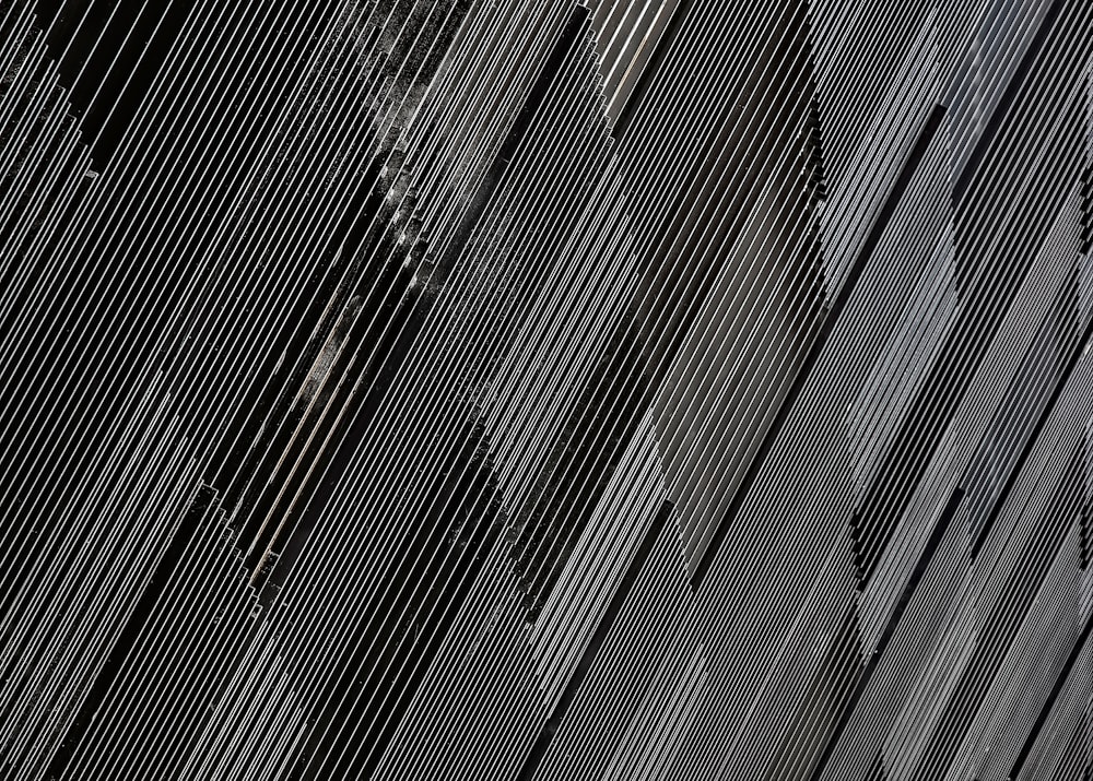 close-up photograph of black concrete wall