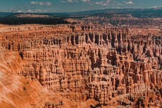 brown rocky mountain in aerial shot