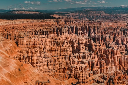 brown rocky mountain in aerial shot