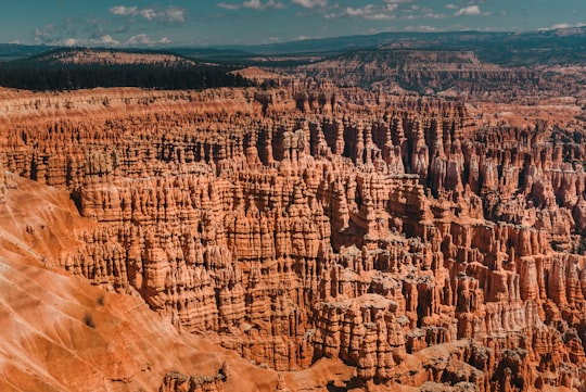 brown rocky mountain in aerial shot in Bryce Canyon National Park United States