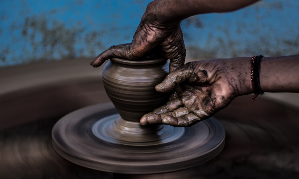 Potter Makes on the Pottery Wheel Clay Pot. Hands of the Master Close-up  during Work Stock Image - Image of shape, kickwheel: 225021903