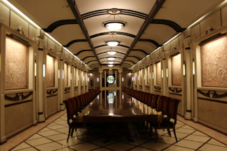 Elegant office meeting room with navy and gold accents reflecting professionalism.