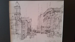 A detailed black and white sketch of a city skyline with intricate line work.